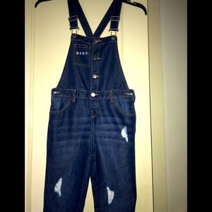 This is a straight legged DKNY Jean jumpsuit with pockets on the front and back!
